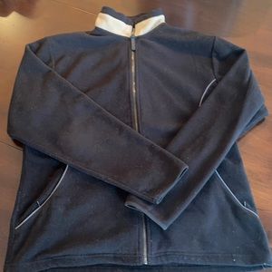 Black fleece jacket with tan detail